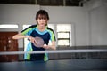 female asian athlete holding ball and paddle preparing to serve Royalty Free Stock Photo