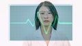 Female Asian doctor looks at virtual medical EKG screen