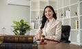 A female Asian lawyer reviews business and real estate laws. Legal consultants provide legal advice and guidance Royalty Free Stock Photo