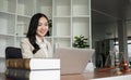 A female Asian lawyer reviews business and real estate laws. Legal consultants provide legal advice and guidance Royalty Free Stock Photo