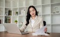 A female Asian lawyer reviews business and real estate laws. Legal consultants provide legal advice and guidance Royalty Free Stock Photo