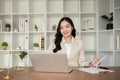 A female Asian lawyer reviews business and real estate laws. Legal consultants provide legal advice and guidance Royalty Free Stock Photo