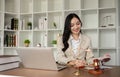 A female Asian lawyer reviews business and real estate laws. Legal consultants provide legal advice and guidance Royalty Free Stock Photo