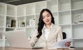 A female Asian lawyer reviews business and real estate laws. Legal consultants provide legal advice and guidance Royalty Free Stock Photo