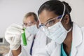 Female Asian Scientist & Test Tube In Laboratory Royalty Free Stock Photo