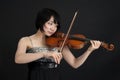 Female asian violonist Royalty Free Stock Photo