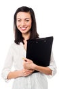 Female assistant holding business files Royalty Free Stock Photo