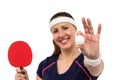 Female athlete holding table tennis paddle and ball Royalty Free Stock Photo