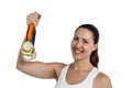 Female athlete posing with gold medals after victory