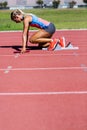 Female athlete ready to start the relay race Royalty Free Stock Photo