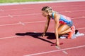 Female athlete ready to start the relay race Royalty Free Stock Photo