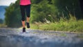 Female athlete runner. closeup on shoe. woman fitness sunset jog