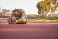 Female athlete stretching on a running track Royalty Free Stock Photo