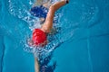 Female athlete swimming fast in crawl style. Royalty Free Stock Photo