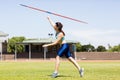 Female athlete throwing a javelin Royalty Free Stock Photo