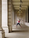 Female Athlete Throwing Javelin In Portico Royalty Free Stock Photo