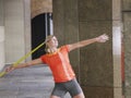 Female Athlete Throwing Javelin In Portico Royalty Free Stock Photo