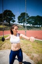 Female athlete about to throw a discus Royalty Free Stock Photo