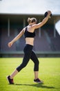 Female athlete about to throw a discus Royalty Free Stock Photo