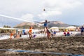 Female athletes in action during a tournament in Beach Volleyball