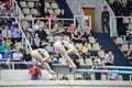 Female athletes perform circle during jumping