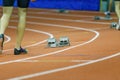 Female athletes at the start in 400m track running Royalty Free Stock Photo