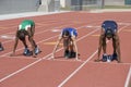 Female Athletes At Starting Line On Race Track Royalty Free Stock Photo