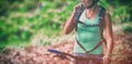 Female athletic drinking water from hydration pack Royalty Free Stock Photo