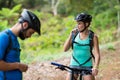 Female athletic drinking water from hydration pack Royalty Free Stock Photo