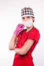 attractive doctor in red form with mask and stethoscope standing on white , Ambulance Royalty Free Stock Photo