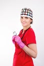 Female doctor in red form with mask and stethoscope standing on white , Ambulance Royalty Free Stock Photo