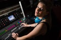 Female audio engineer using sound mixer Royalty Free Stock Photo