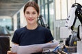 Female automation machine engineer student study and inspection control robot machine in university workshop. ai robot technology