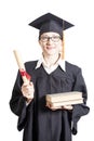 Female bachelor with eyeglasses in mantle holding books and diploma Royalty Free Stock Photo