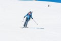 Female back-country skier tackling a steep slope. Royalty Free Stock Photo