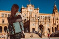 Female backpacker visits Seville, Spain. European backpacking adventure