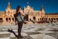 Female backpacker visits Seville, Spain. European backpacking adventure