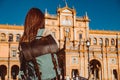 Female backpacker visits Seville, Spain. European backpacking adventure