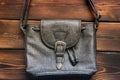 Female bag on a wooden background. Close up Royalty Free Stock Photo