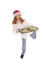 Female baker chef with hat of Santa Claus dancing with Christmas Royalty Free Stock Photo