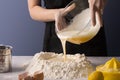 Female baker hands making dough for a homemade sweet bread Royalty Free Stock Photo
