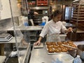 Female Baker Preparing Baked Goods and Pastry in South Melbourne Market Photo