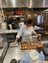 Female Baker Preparing Baked Goods and Pastry in South Melbourne Market Photo