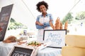 Female Bakery Stall Holder At Farmers Fresh Food Market Royalty Free Stock Photo