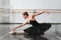 Female ballet dancer posin on rehearsal