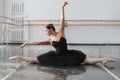 Female ballet dancer posin on rehearsal