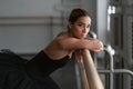 Female ballet dancer resting after rehearsal Royalty Free Stock Photo