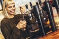 Female bartender tapping beer in bar Royalty Free Stock Photo