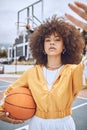 Female basketball player taking selfie on court, looking confident and training for fitness outside. Portrait of a black Royalty Free Stock Photo