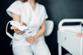 Female beautician hands prepares equipment Royalty Free Stock Photo